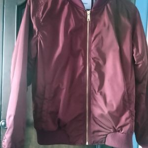 A burgundy bomber